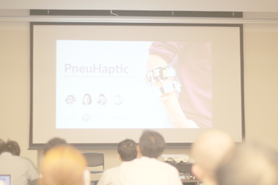 PneuHaptic: Delivering Haptic Cues with a Pneumatic Armband